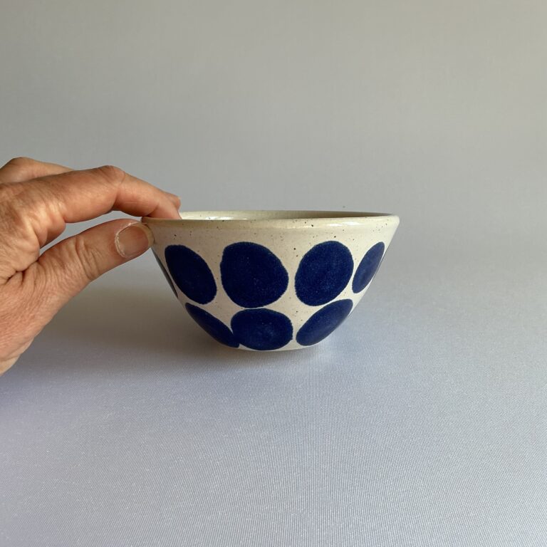 Stoneware bowl with large indigo spot design