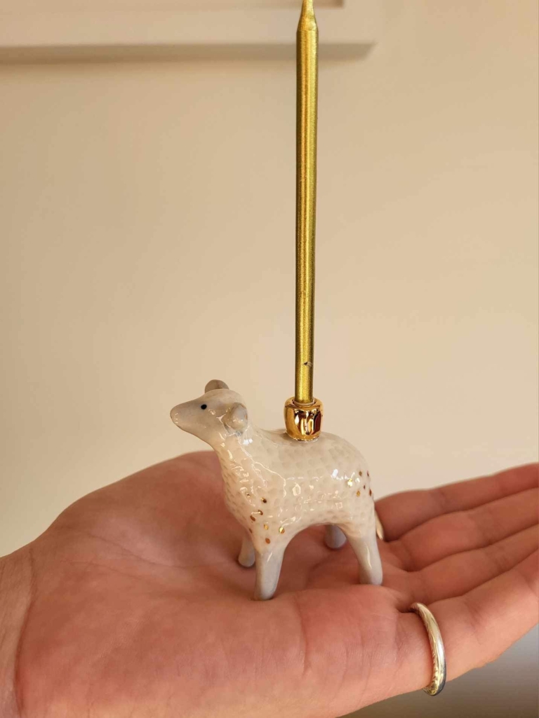 Porcelain sheep candle holder
