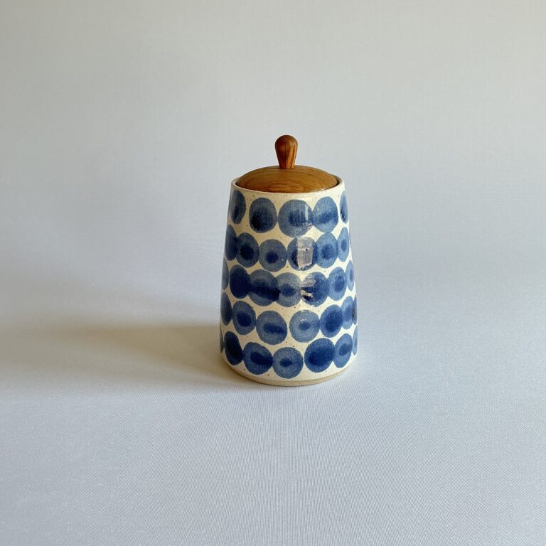 Wood lidded jar with small spot