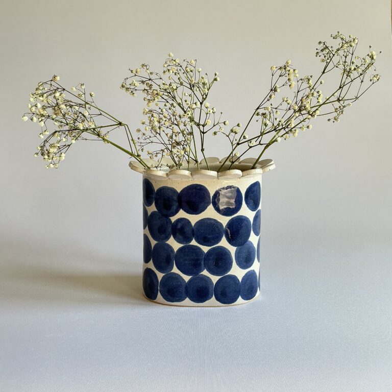 Oval vase with large indigo spot