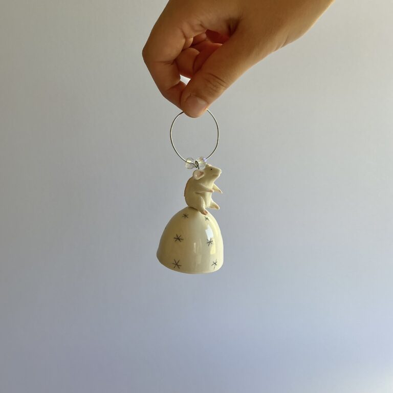 Christmas tree bell, porcelain with pencil drawn snowflake design and topped with a handmade Mouse.
