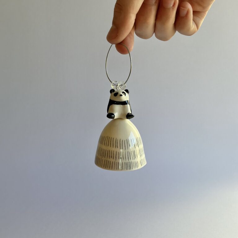 Christmas tree bell, porcelain with pencil dash design and topped with a handmade Panda bear.