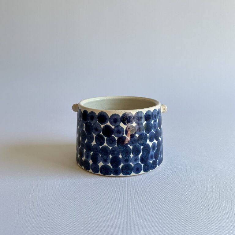 planter with opaque glaze and small indigo spot