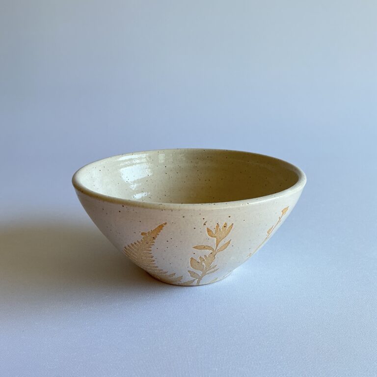 Stoneware bowl with white hedgerow design